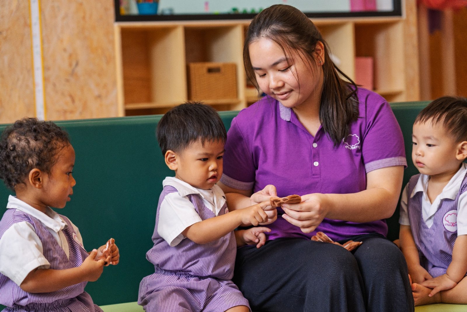 Mulberry teacher engaging with children during a learning moment