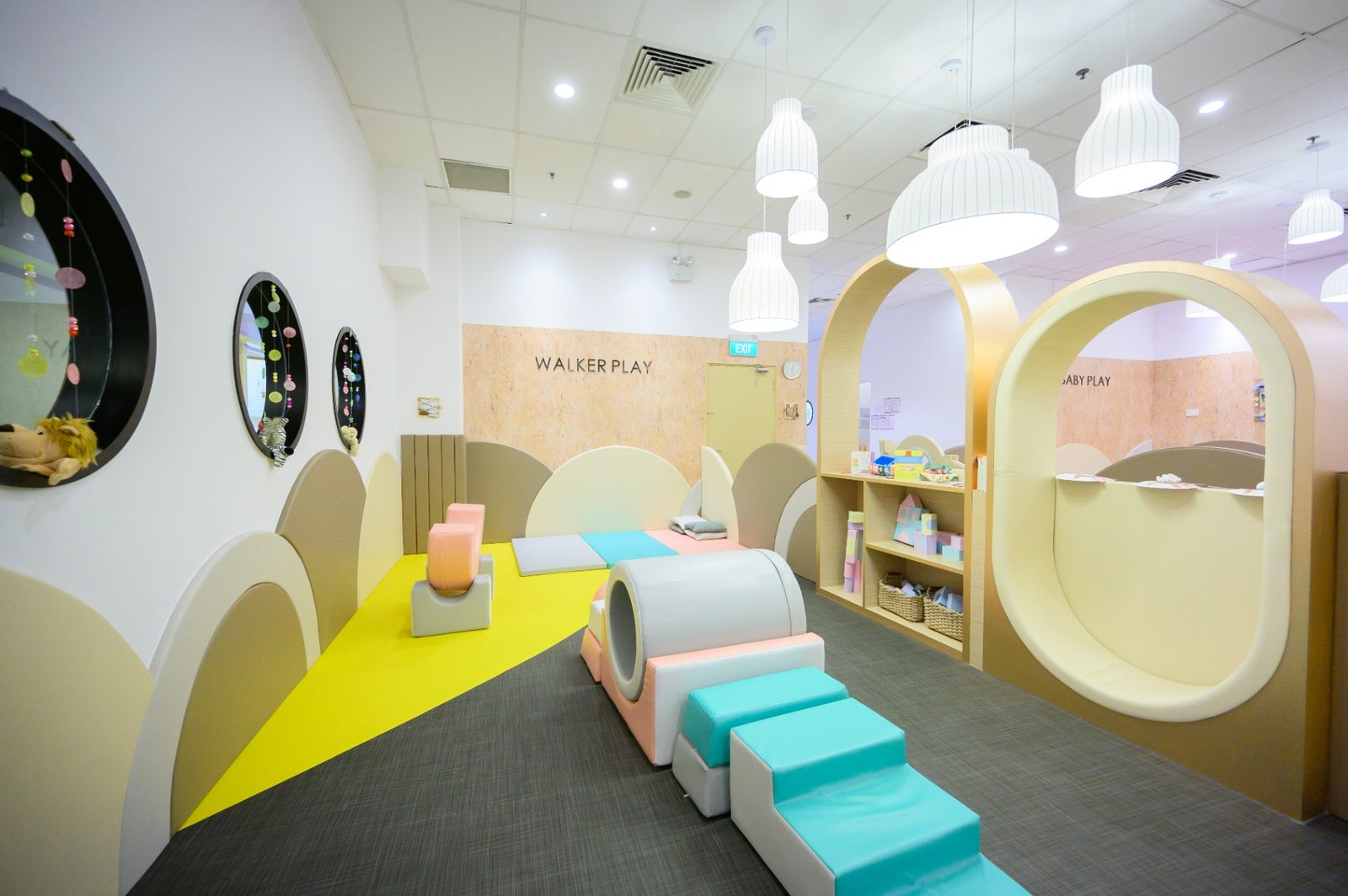An infant exploring sensory materials