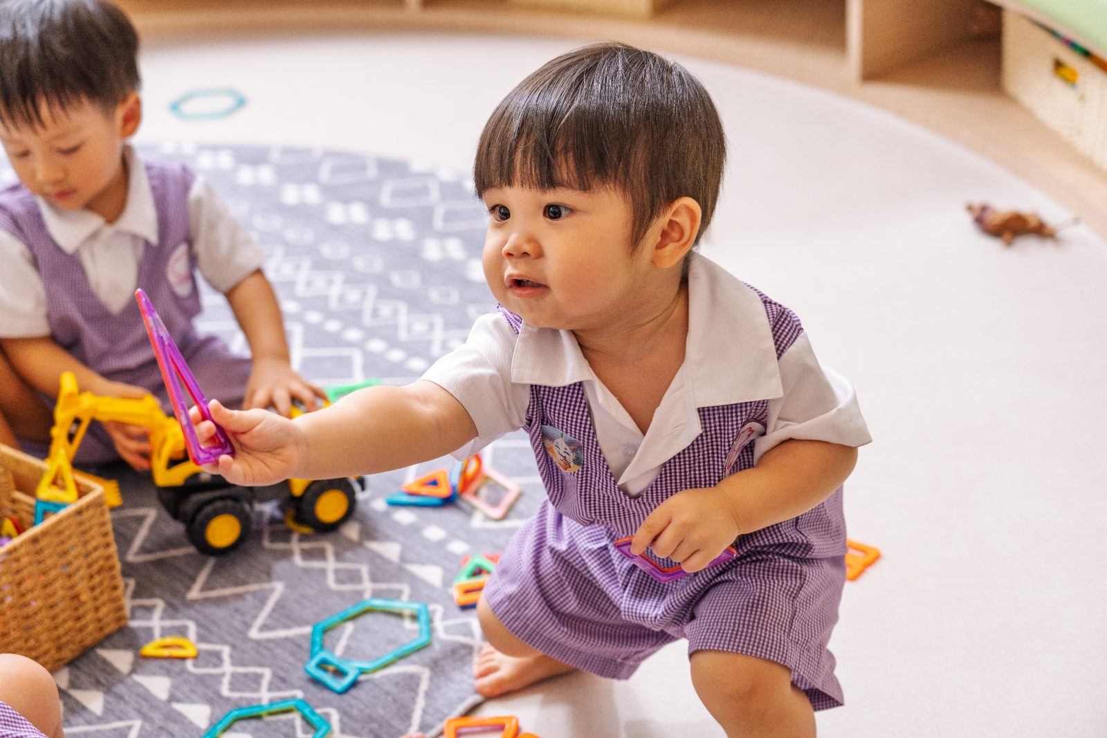 A child working with maths manipulatives