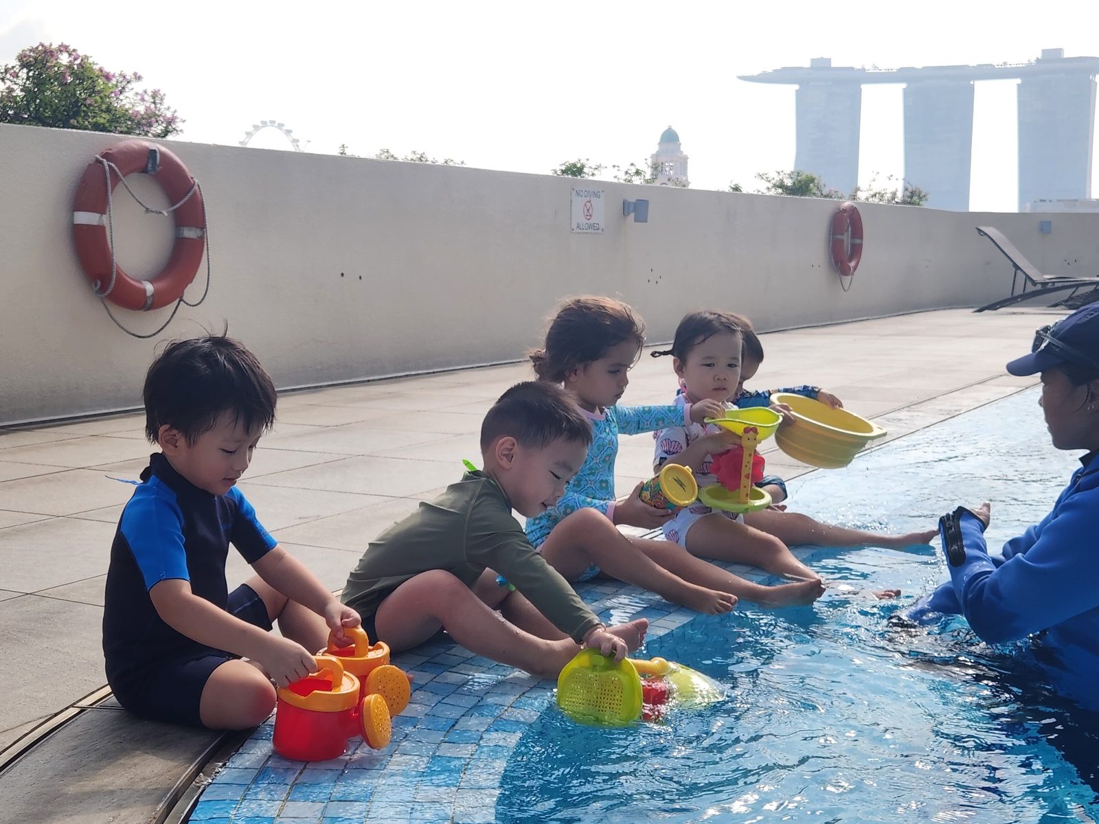 Children enjoying swimming lessons at Mulberry
